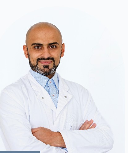 Dr. Mansour Aljishi, orthopaedic and spine surgeon, in a white coat